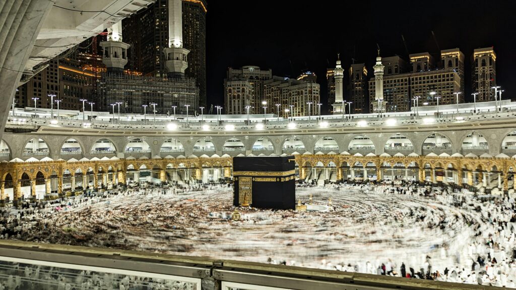 Captivating night view of worshippers circling the Kaaba at Masjid al-Haram, Mecca.